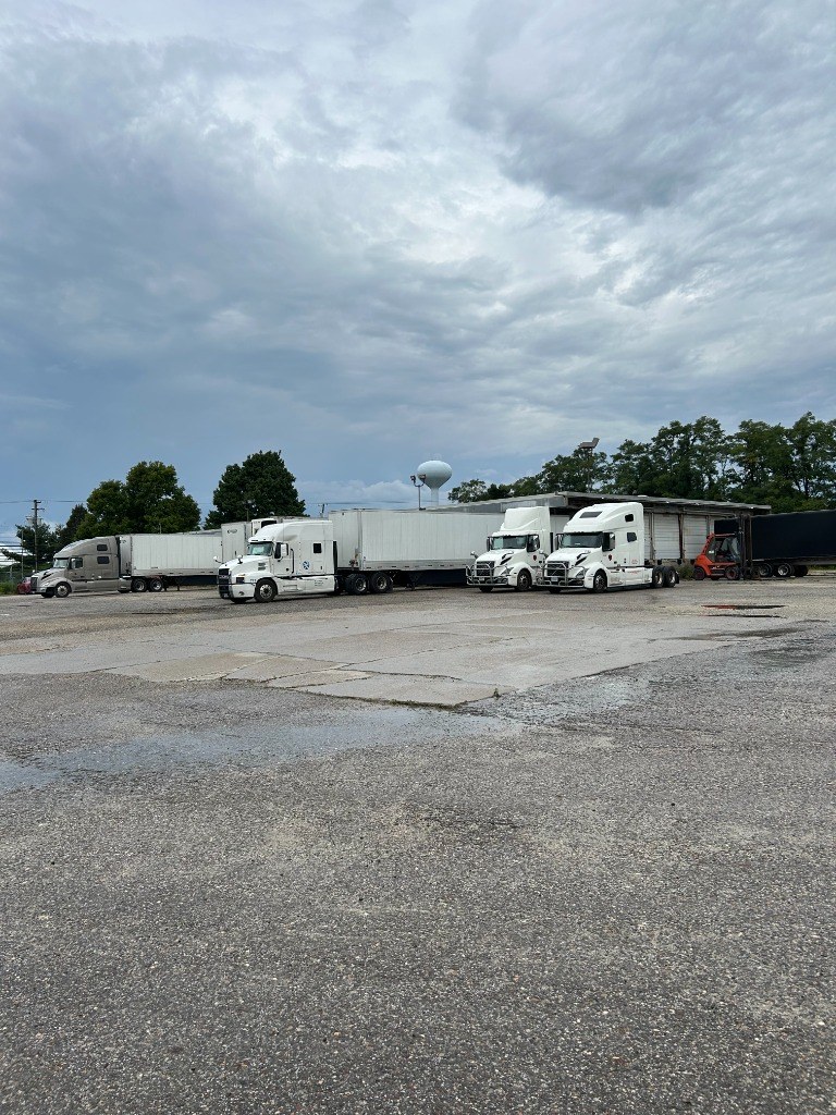 Truck staging apron with marked trailer spaces